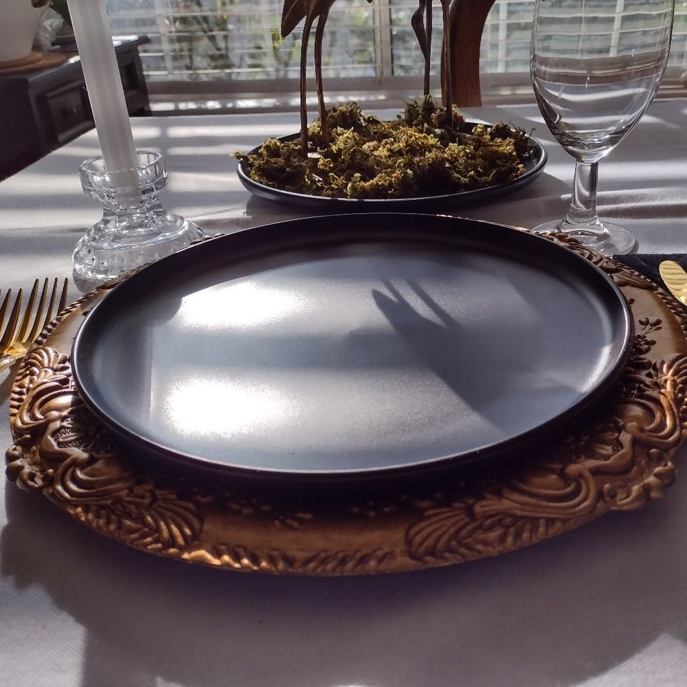 1st. NWT 2 black ceramic plates. Perfect for so many occasions!